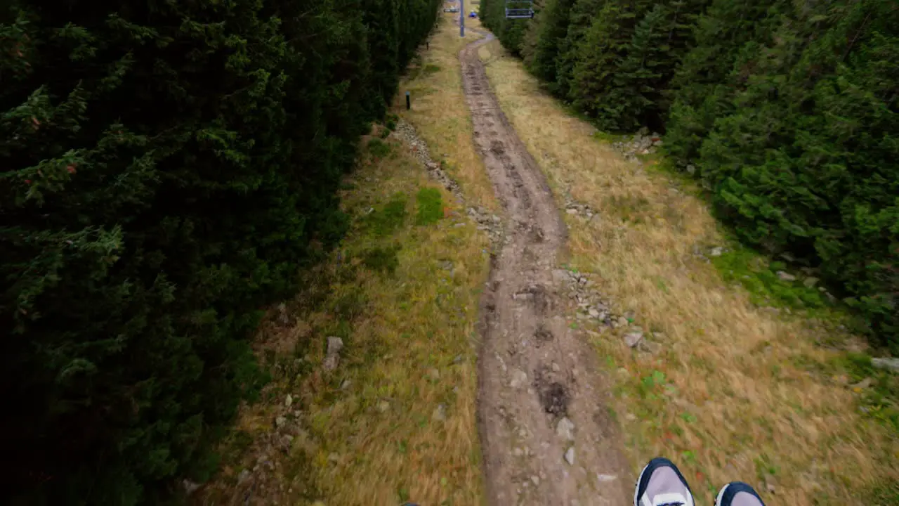 Cable transport cable car going down the mountain tilt-up movement cloudy weather Karpacz Poland