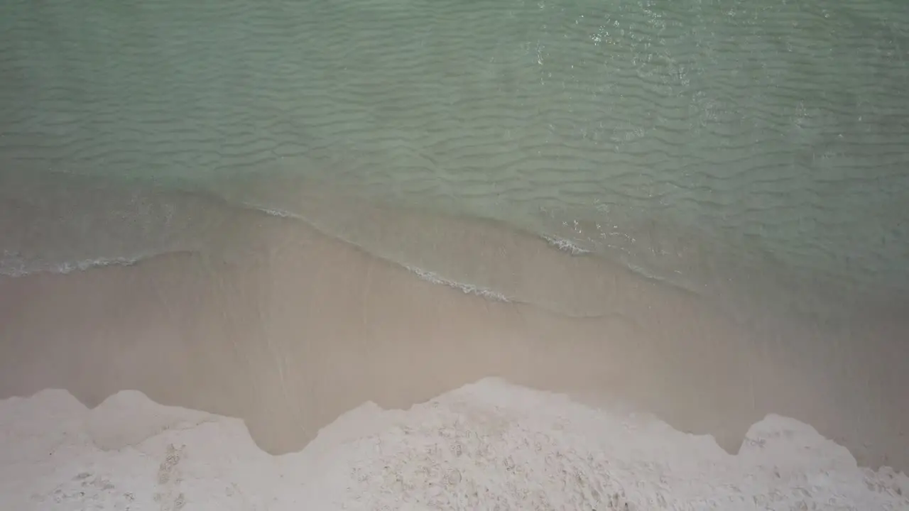 Clearwater waves on white sand beach on the Gulf of Mexico Aerial view