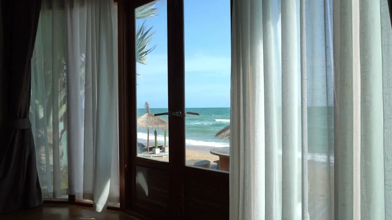 curtain and window with sea beach outside view