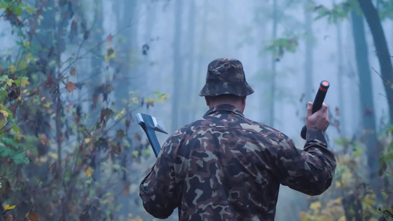 Brutal Man With An Ax And A Flashlight Walks Through The Forest Creepy Crime Scene