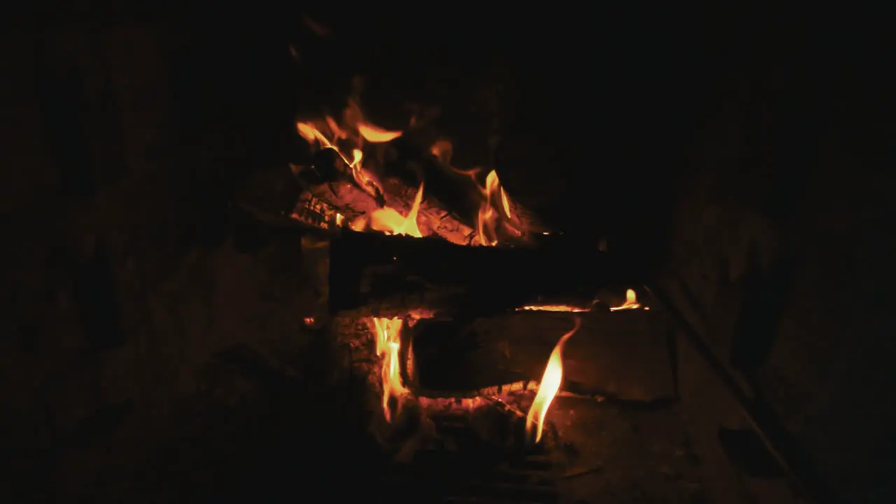 Burning bonfire on dark background Bright marching fire with sparks