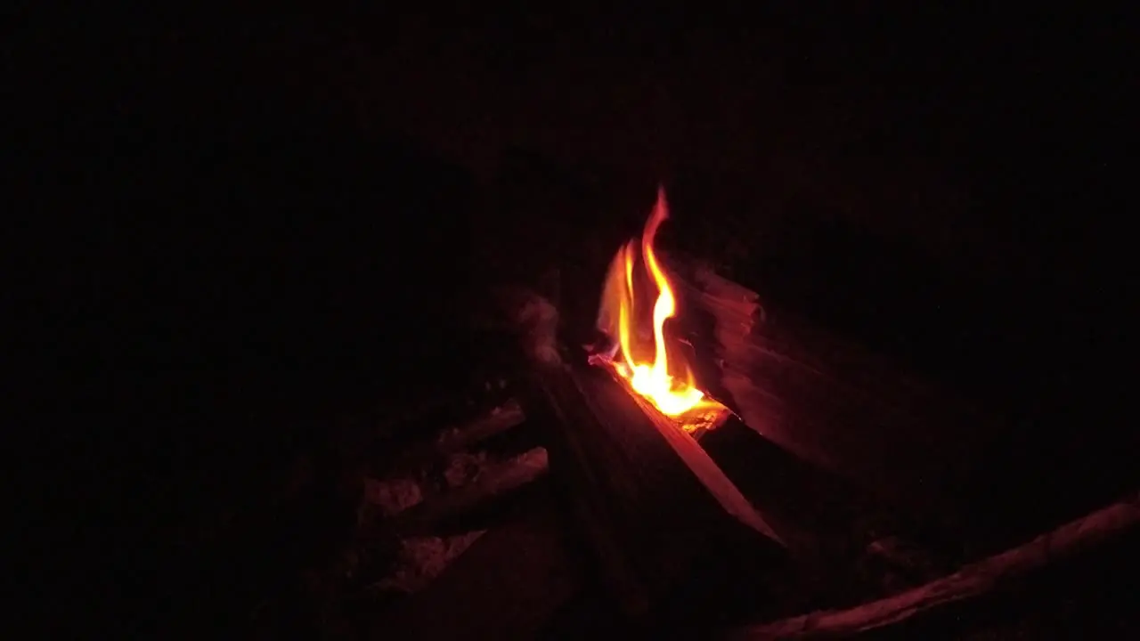 Campfire burning at night in Iceland