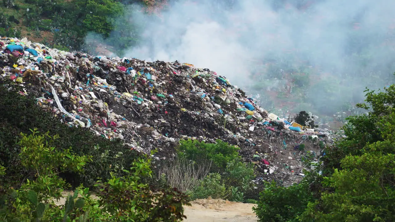 Burning open air dump scene Vietnam Static