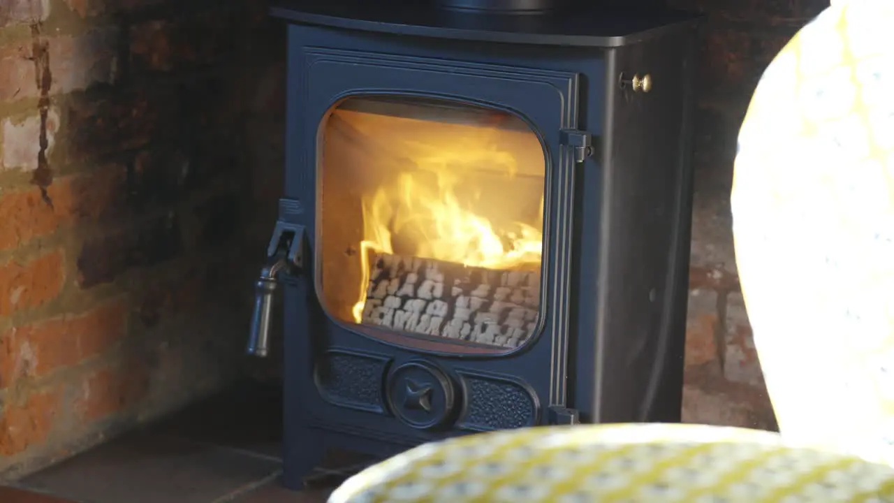 fire stove burning in stone fireplace