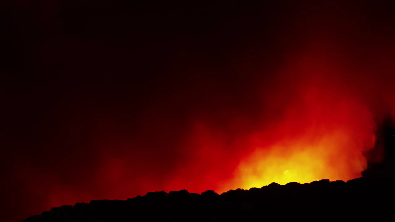 forest fire burning at night Time lapse on a mountain nighttime spain