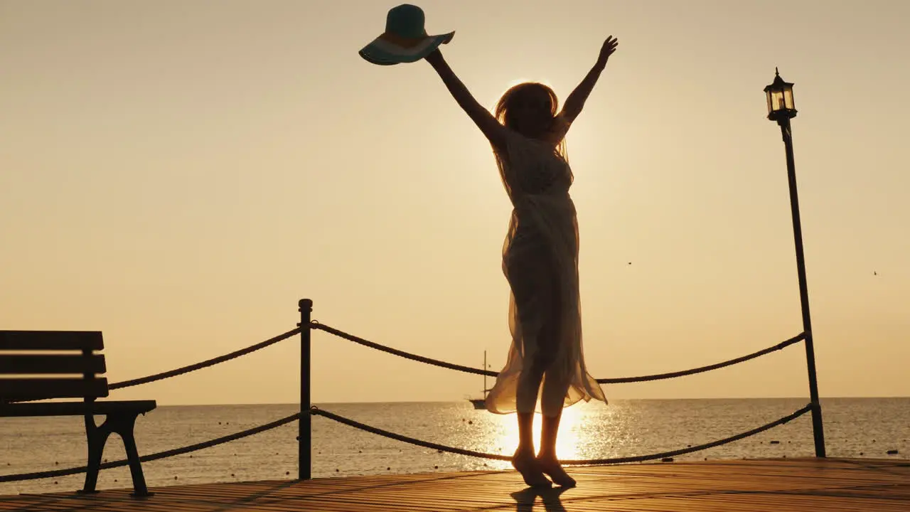 A Woman Meets The Dawn At Sea Emotionally Spinning With A Hat In His Hand On The Pier Dream Of Trave