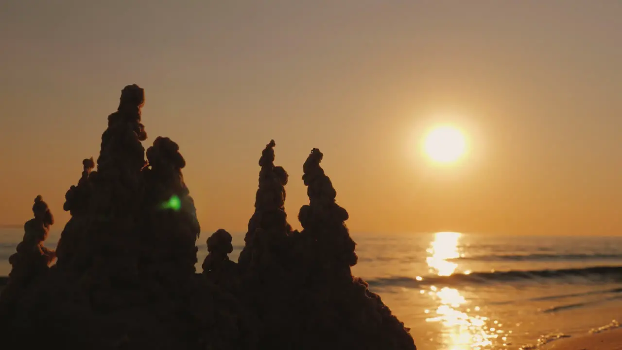 A Sand Castle By The Sea At Sunset 4K Video