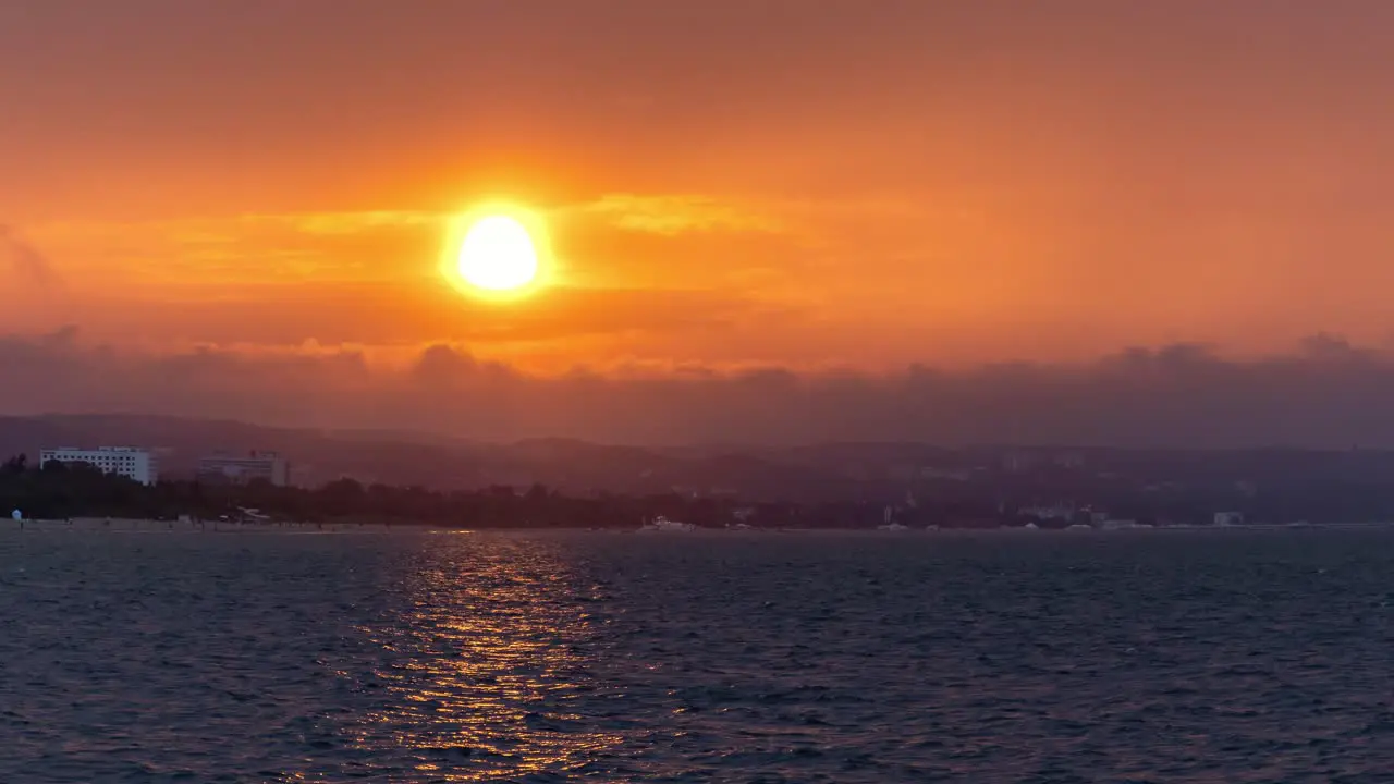 Orange Sunset Over Coastline Time Lapse