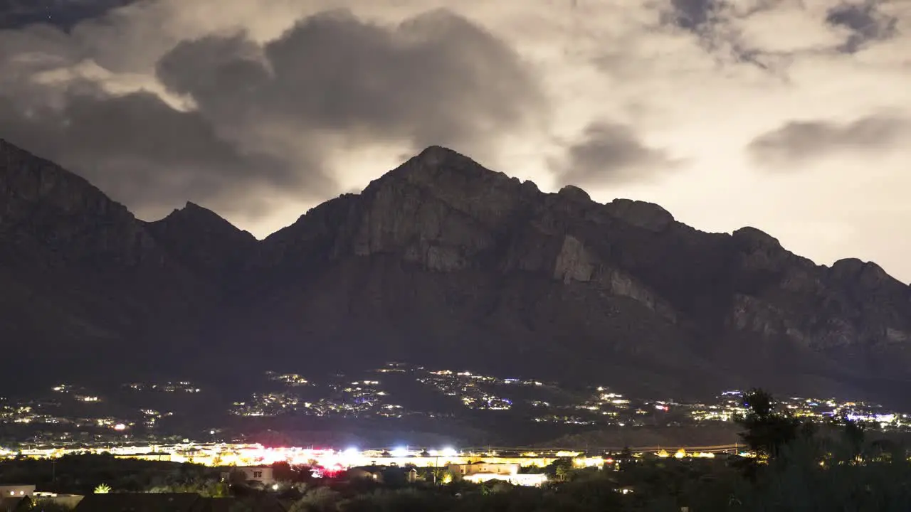 Clouds dissipate over the Catalina Mountain range Oro Valley Arizona