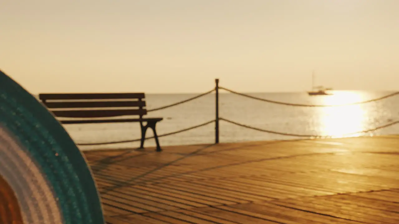 A Woman With A Hat In Her Hand Walks The Pier Towards The Rising Sun Dream Of Travel Concept Steadic