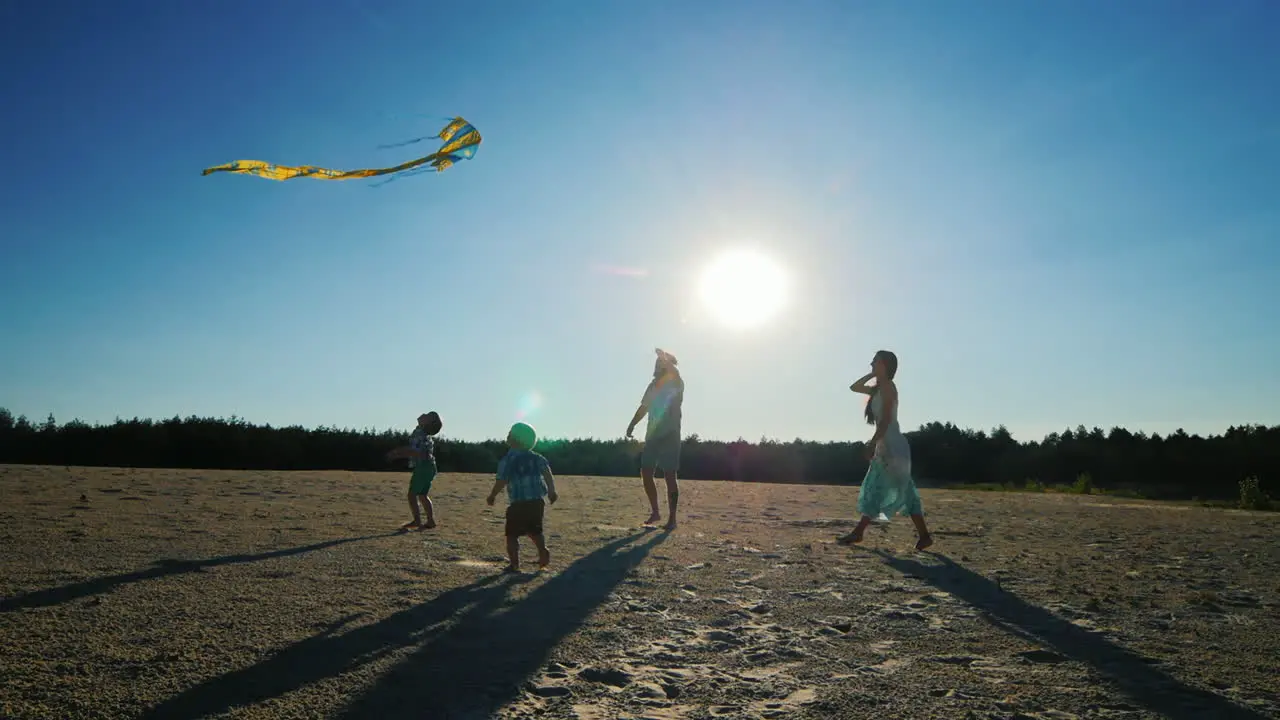 Happy Family Fun Runs Into The Sky Kite