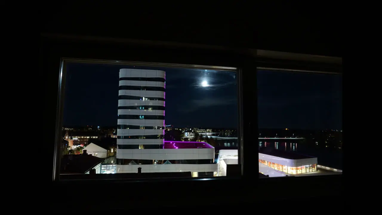 Skyline and traffic in Umea Sweden seen through hotel window