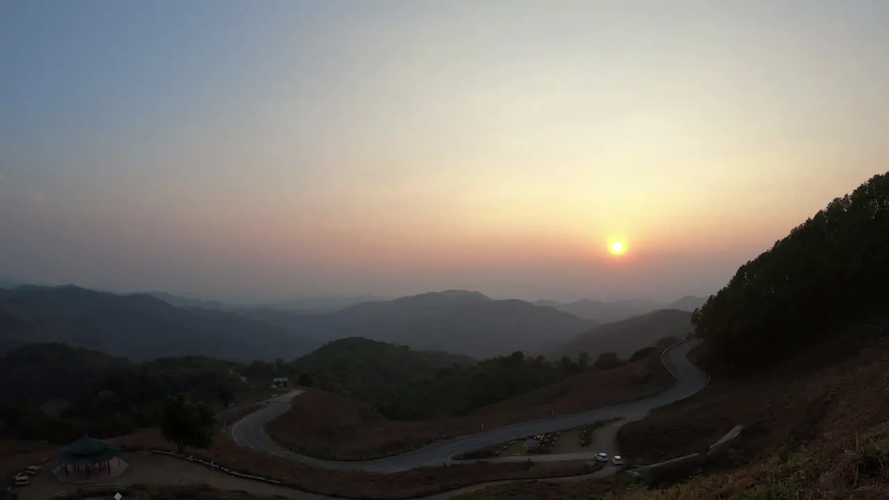 sunset with layer mountain and road in Thailand