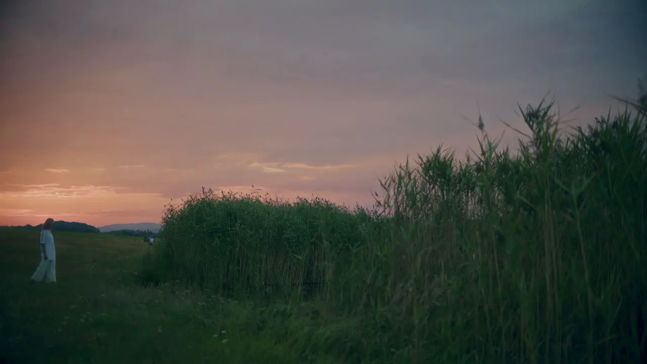 Woman Walking By The Lake Night