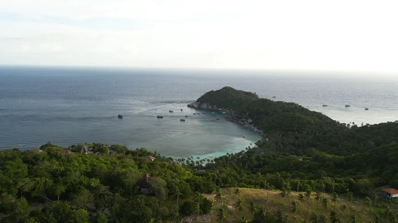 Aerial view of koh tao highlands overlooking tanote bay Thailand south east Asia travel holiday destination unpolluted natural green cliff with wild vegetation