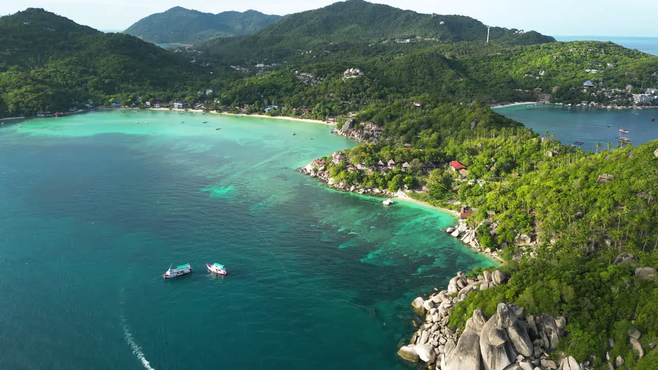 Aerial view of scenic dreamy seascape in south east Asia koh tao Thailand pristine ocean water unpolluted natural green forest with cliff and seascape