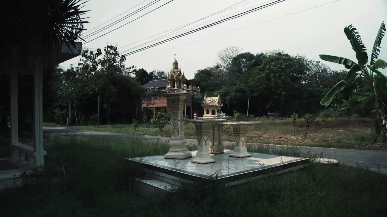 Spirit house small shrines in a garden in Thailand