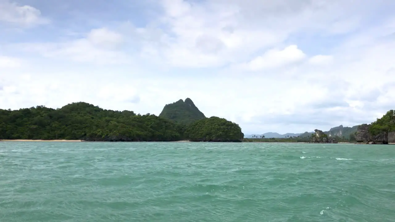 Moving shot of islands in southern Thailand from fast moving boat