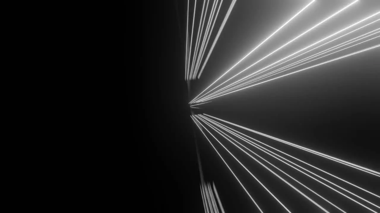 Computerized animation of dark black space with white rays of light emitting from a central source