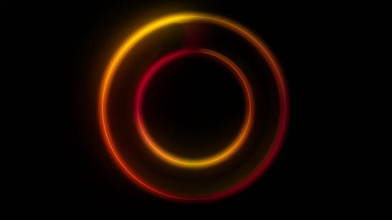 Seamless loop spinning golden glowing ring on black background