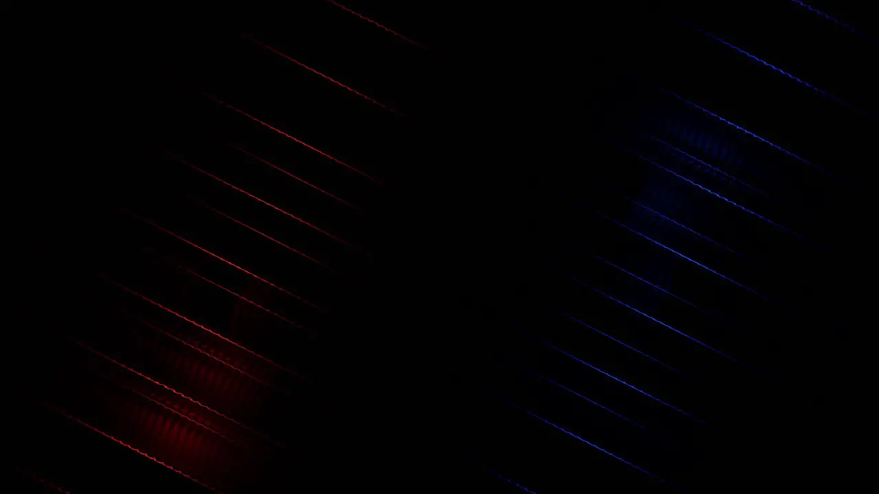 Computerized animation of dark black space with diagonal blue and orange rows of lines