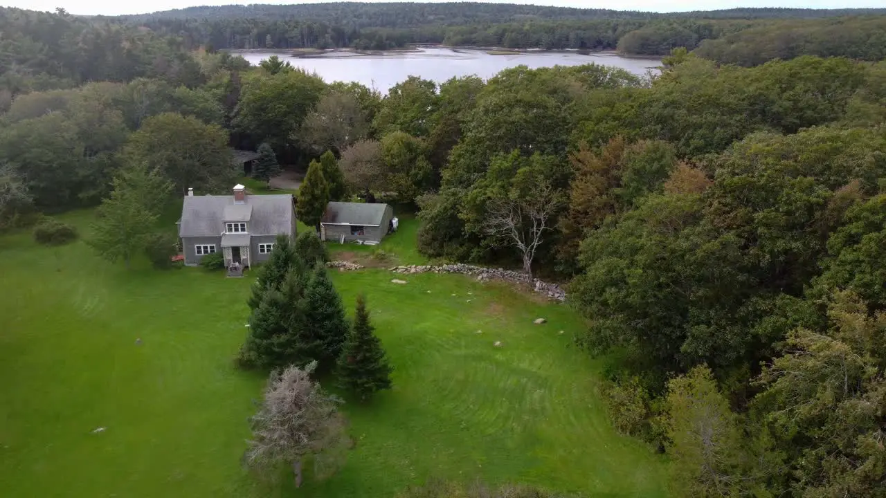 Fly over old home at Popham Beach in Maine