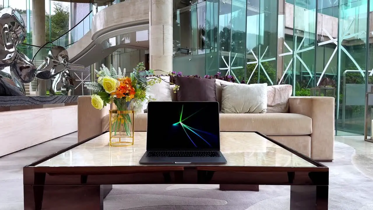 MacBook Laptop Displaying Flurry Screensaver in a Luxurious Upscale Home