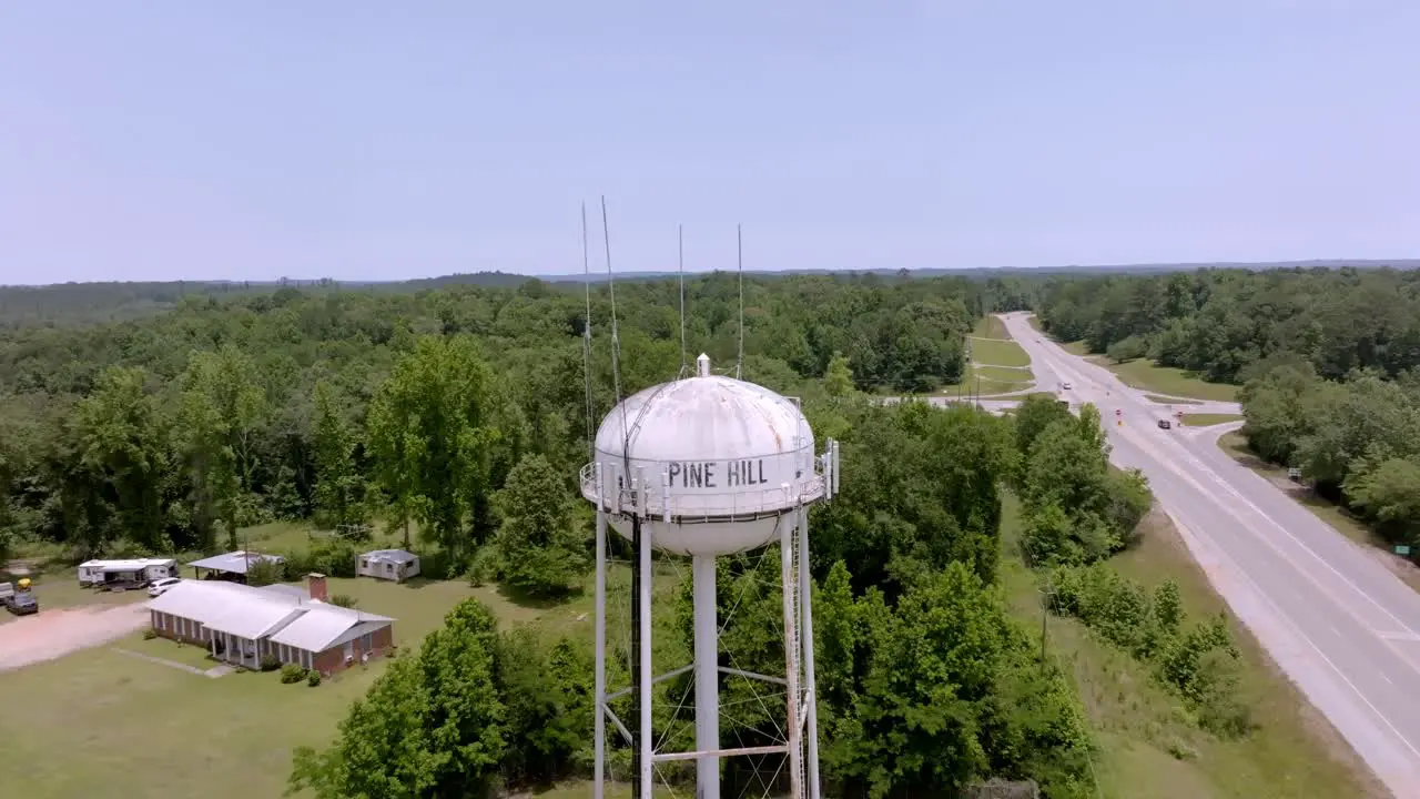 Pine Hill Alabama water tower with drone video pulling back