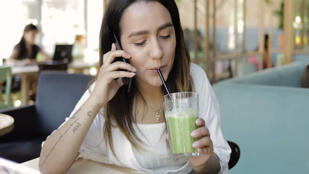 Young woman using mobile phone