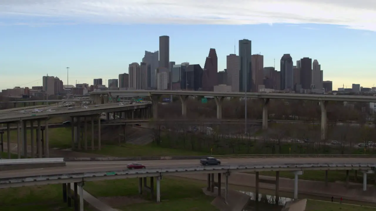 Ascending drone shot that reveals downtown Houston Texas and surrounding landscape