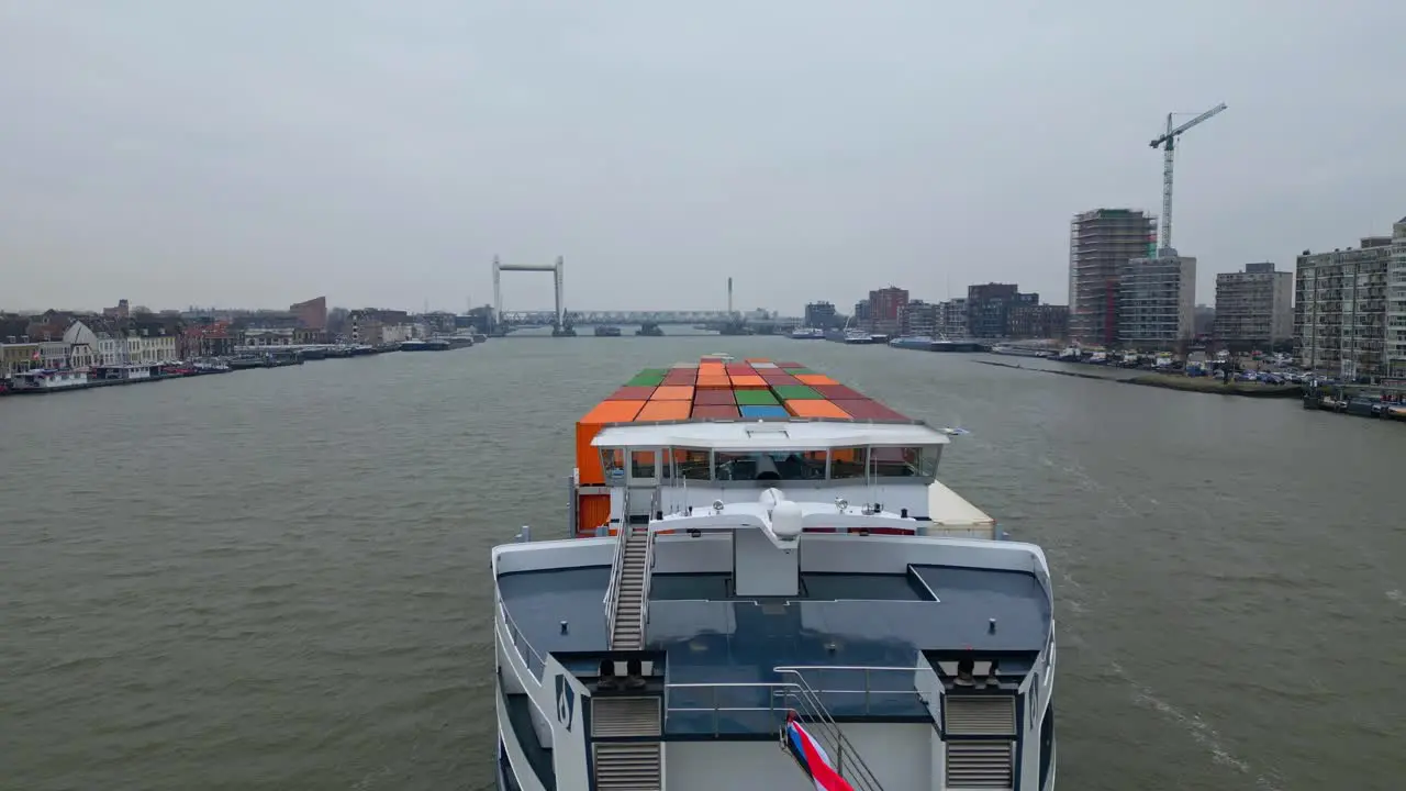 29 January 2023 Stern View Of Scaldis Container Ship Travelling Along Oude Maas On Overcast Day In Dordrecht