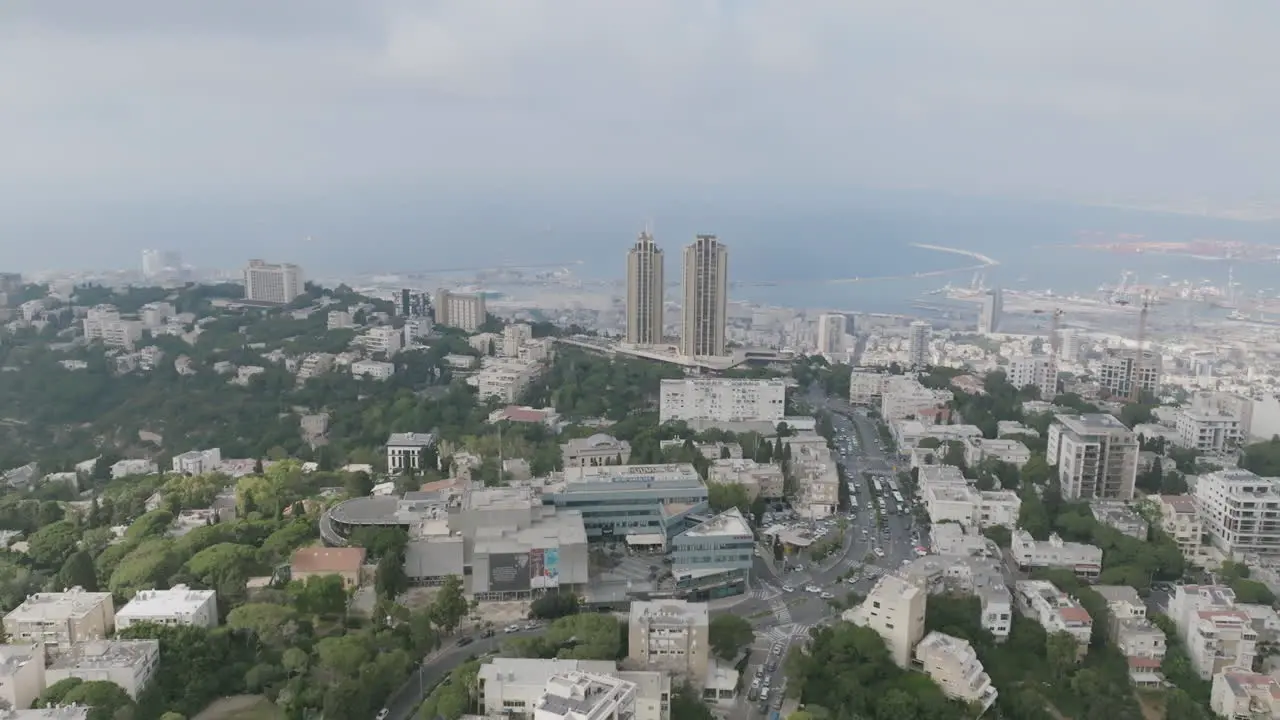 Aerial rotation around high rise buildings on Mount Carmel in Haifa Israel