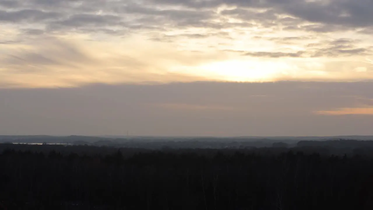 timelapse of the sun setting on a cold winter day at doeberitzer heide in brandenburg germany