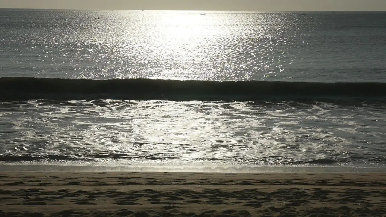 Sunset Waves crashing onto the beach