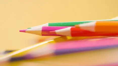 Close Up Shot Of Randomly Arranged Rotating Multi-Coloured Pencils 7