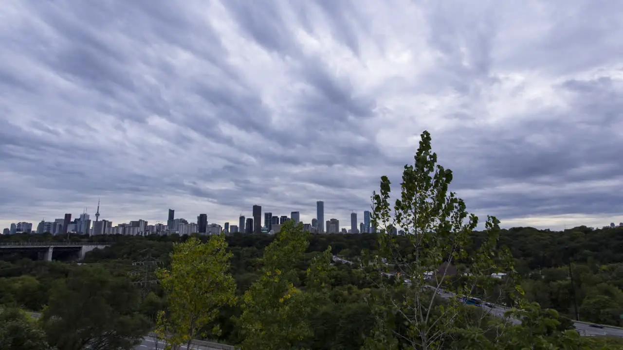 Timelapse of stormy overcast sky over the downtown Toronto skyline from Chester Hill Lookout