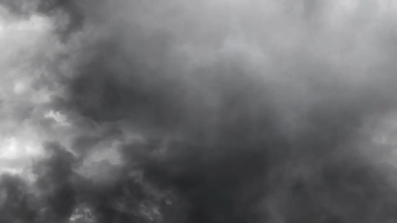 lightning flashes among thick cumulonimbus clouds in the dark sky