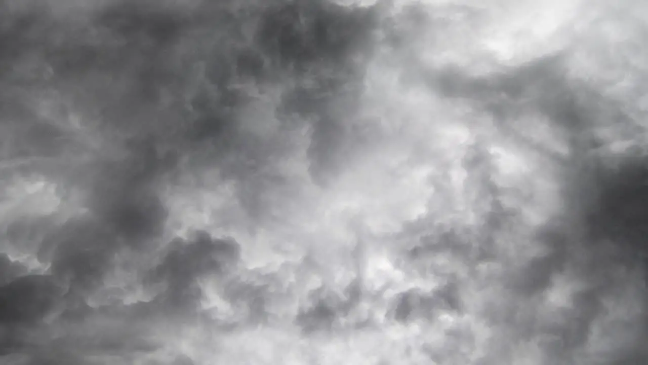 dark clouds and lightning strikes in the sky