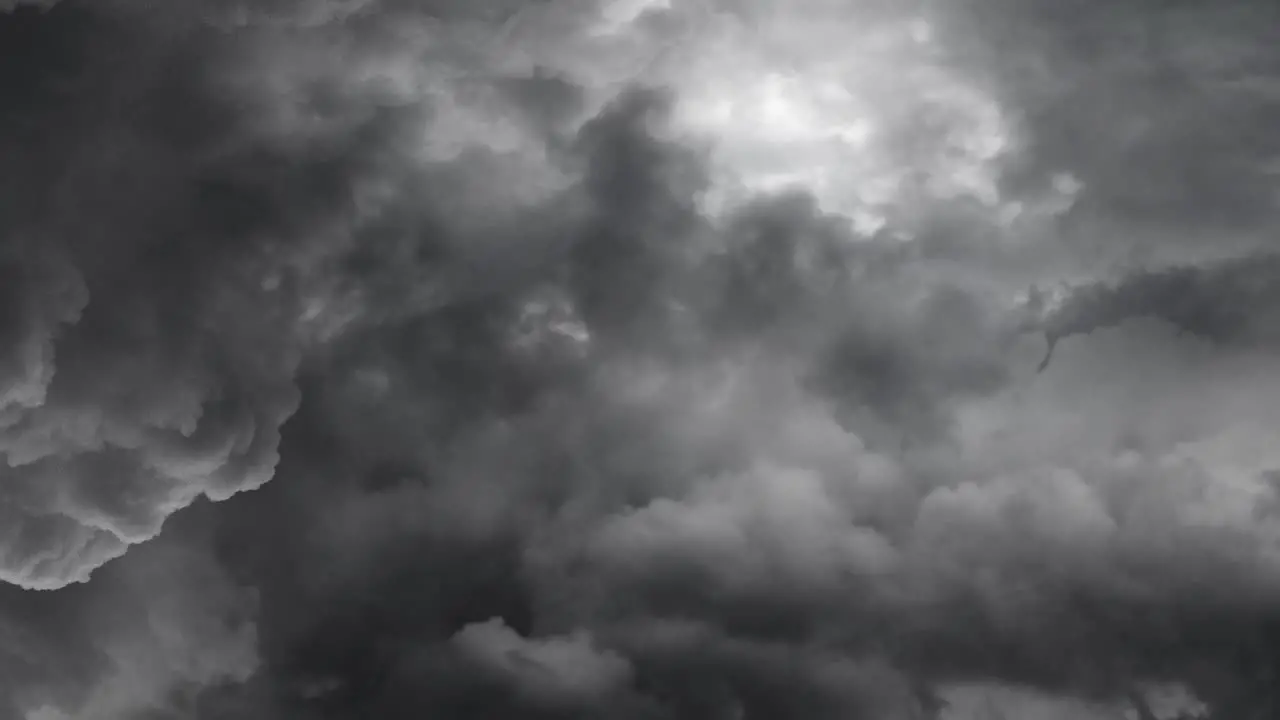 4k view of lightning storm inside dark clouds