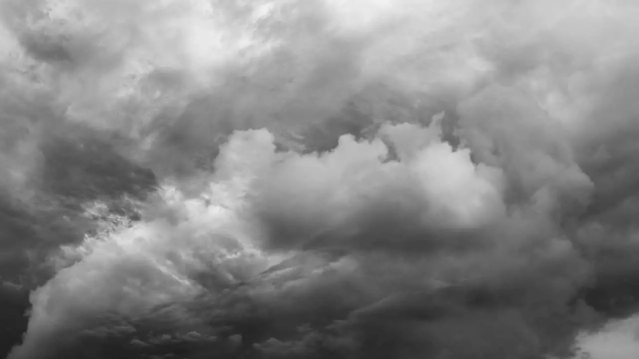 a storm in the dark sky and a bolt of lightning