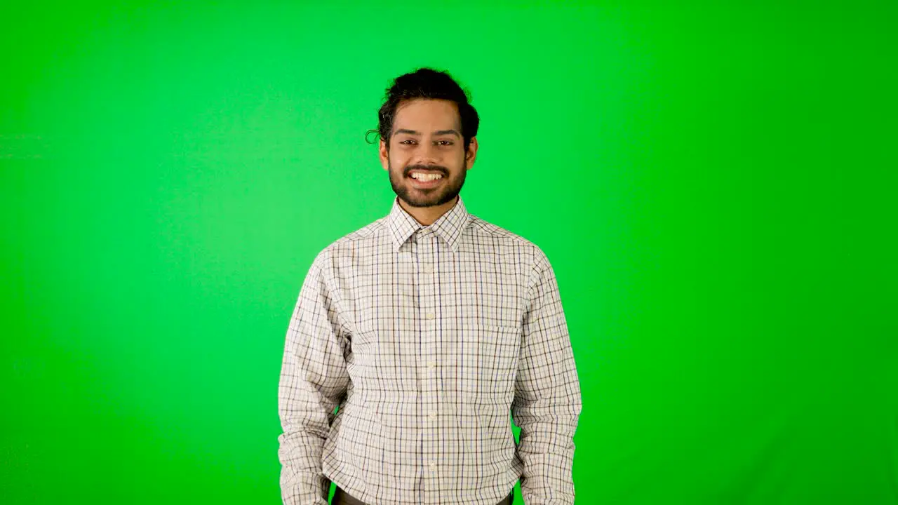 Indian business man thumb up with green background