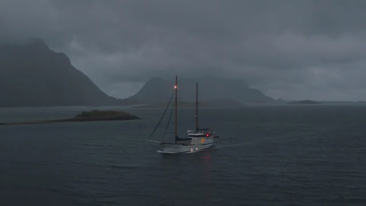 Sailboat in the Arctic lofoten sailing during a storm