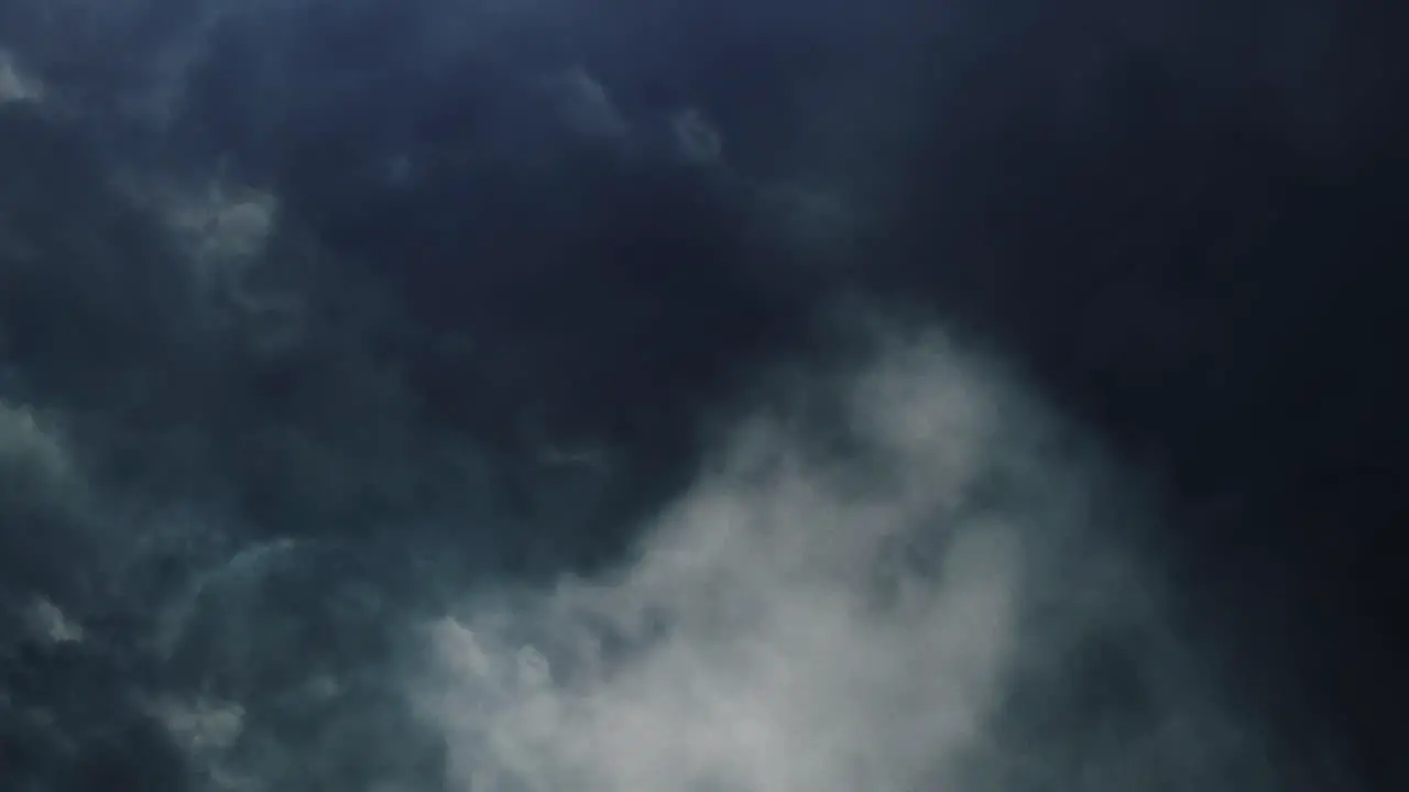 4k thunderstorm timelapse flying through dark cumulonimbus clouds in the sky