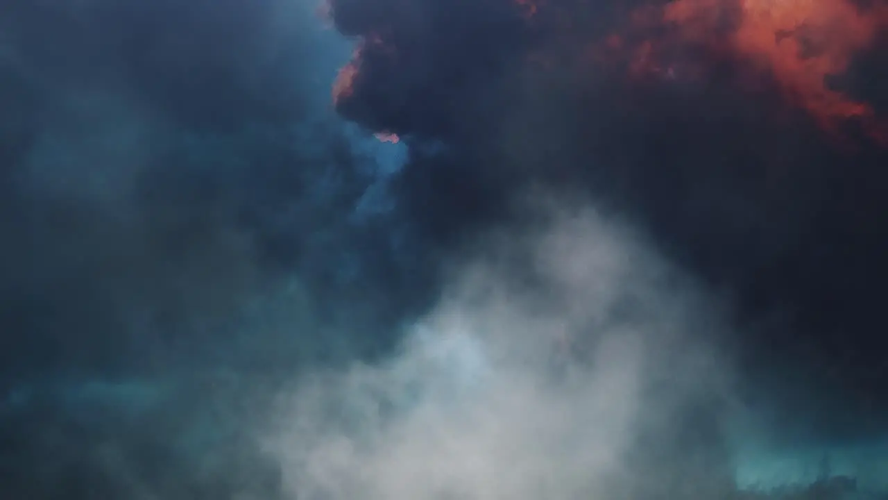 thunderstorm with flash of lightning in orange clouds