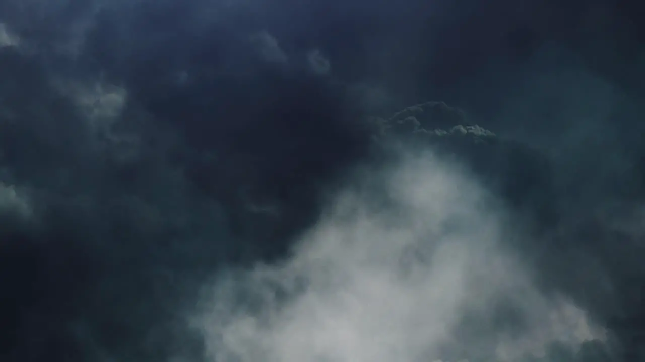 4k thunderstorm flying through dark cumulonimbus clouds in the sky