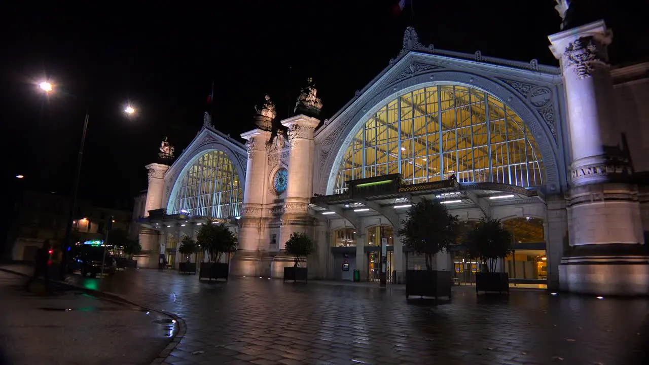 Exterior of a French railway station at night