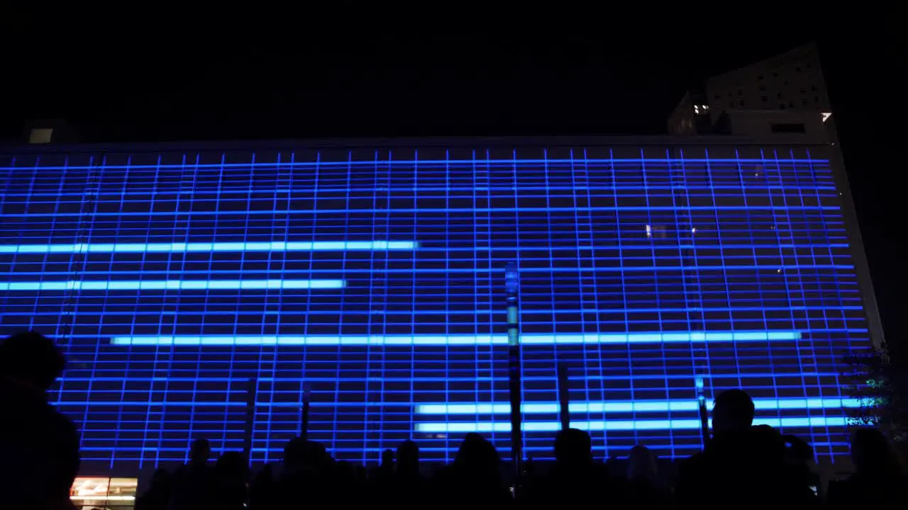 LED light show on facade of building at Glow festival in Eindhoven Netherlands