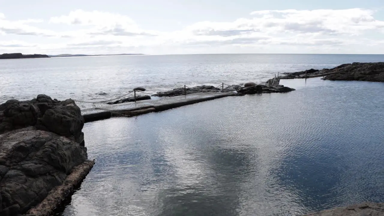 Kiama Ocean Rock Pool in New South Wales Australia with barrier chains Locked shot