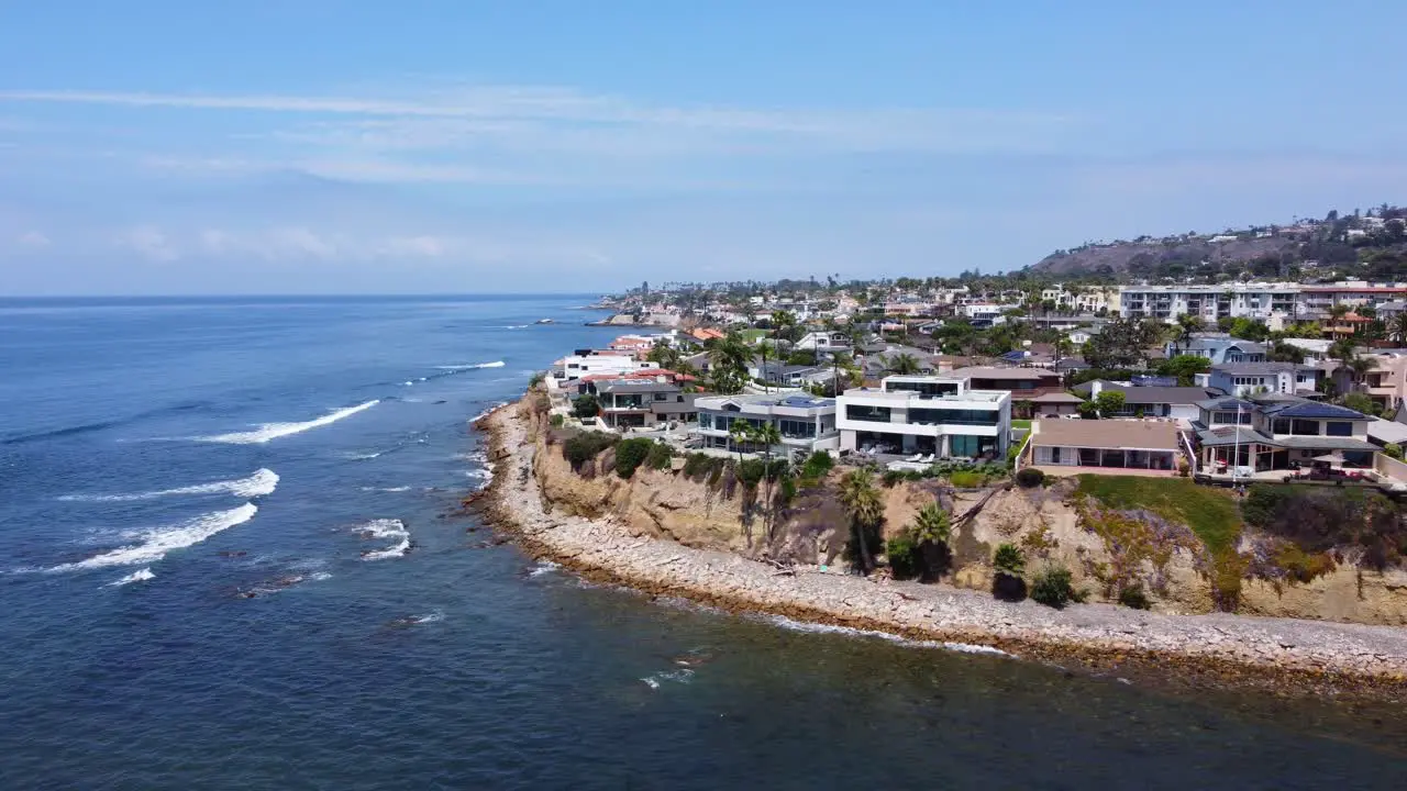 Aerial shot of mansions on the cliffs overlooking the Pacific Ocean in San Diego California