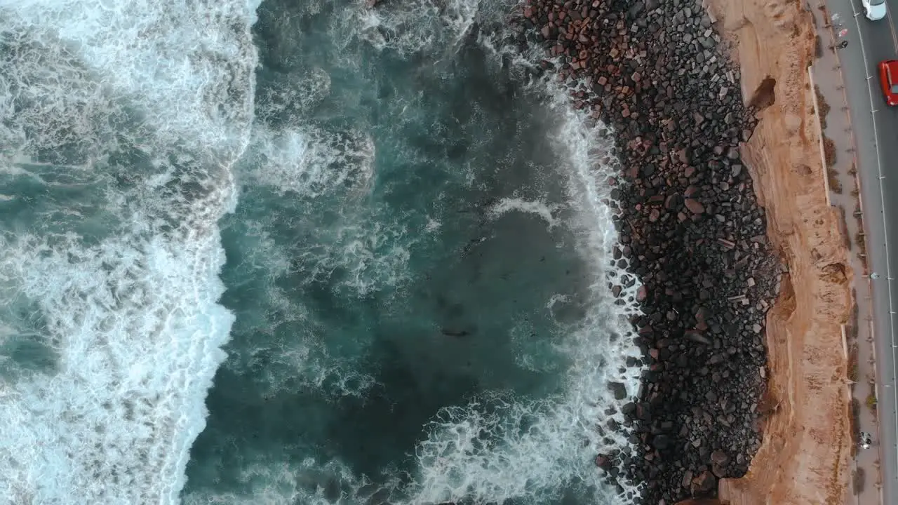 Epic drone shot above beach in San Diego in Southern California